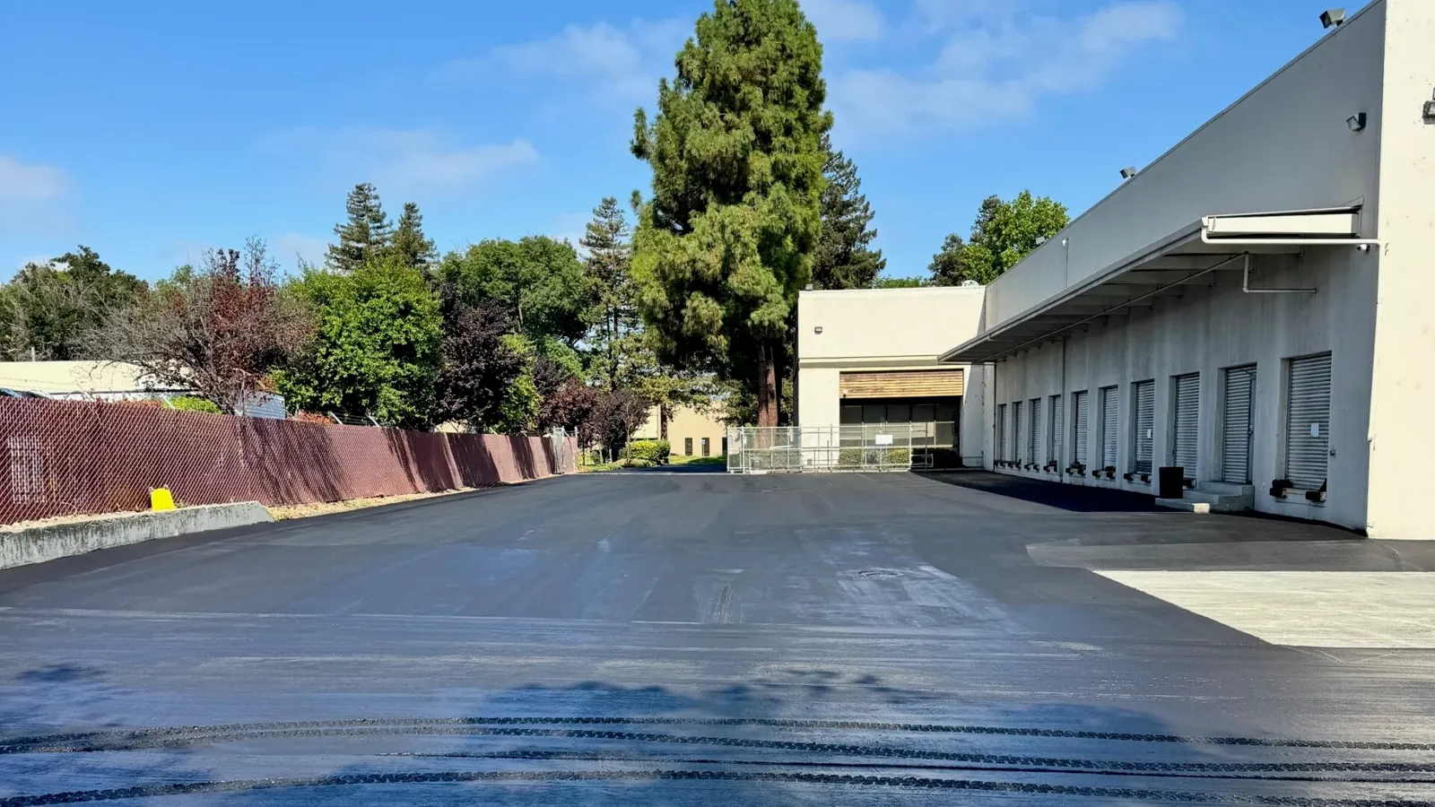 Sealcoating vs. Mill-and-Overlay: How to Choose the Right Treatment for Your Commercial Parking Lot