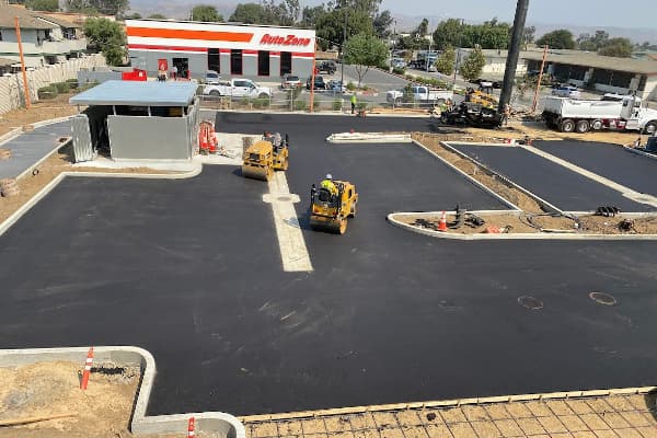 Parking lot being paved with asphalt