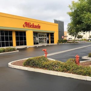 Retail store with new sealcoating on parking lot