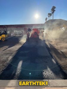 steam coming off hot asphalt
